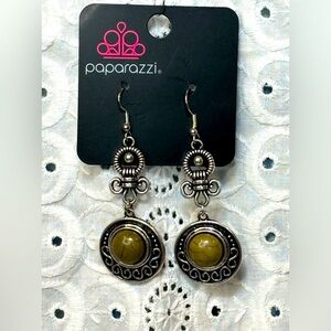Paparazzi earrings silver toned and faux green stones. Drop is 2 1/2 inches
